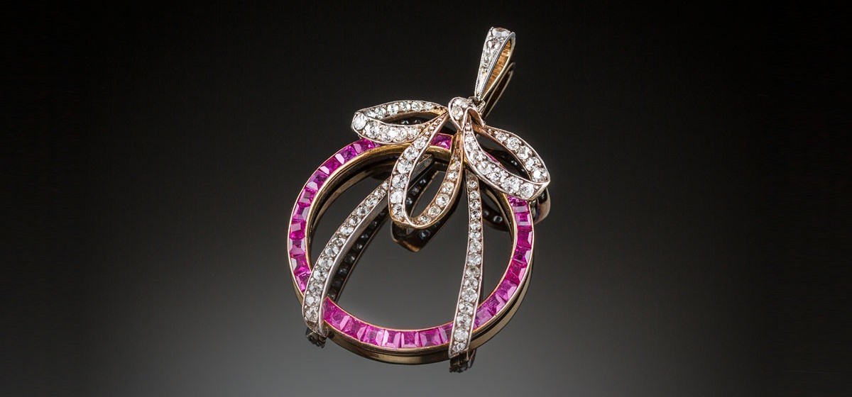 A Belle Epoque ruby and diamond pendant in silver and gold 