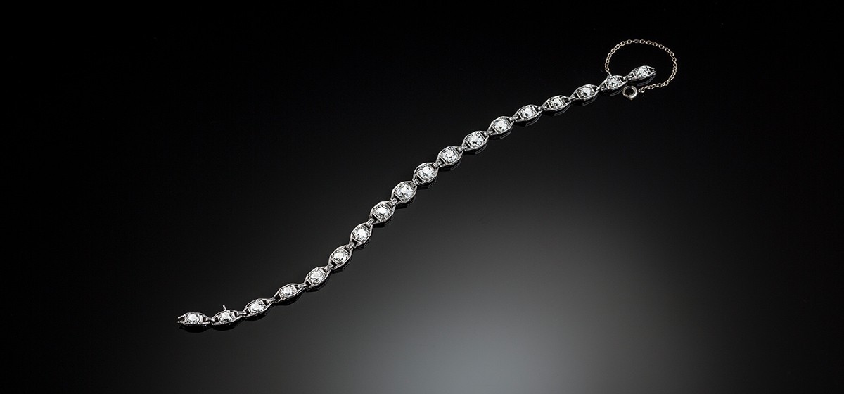 An Art Deco diamond set platinum bracelet