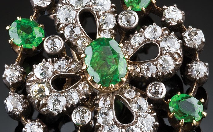 Detail of Antique diamond and demantoid garnet set pendant