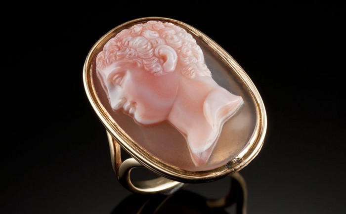 A large antique cameo ring in a yellow gold setting