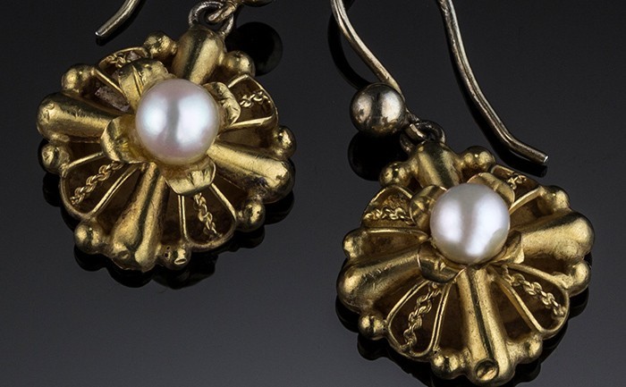 Detail of Early twentieth century pearl and 18ct. gold drop earrings