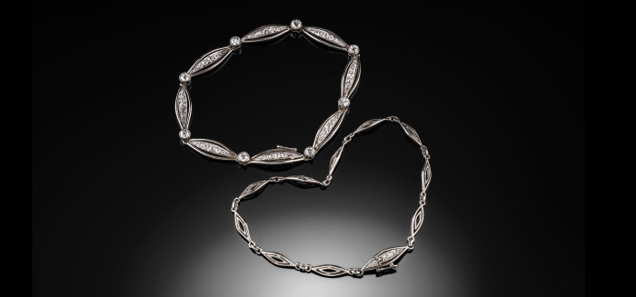 TWO ART DECO PLATINUM AND WHITE GOLD DIAMOND BRACELETS TRANSFORMING TO A NECKLET